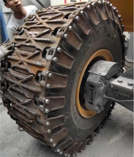 23.5-26 Cadena antideslizante Cadena para neumáticos Cadenas universales Cadenas de acero Cadenas para cargadoras de ruedas para carretillas elevadoras